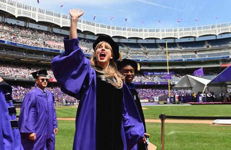 Taylor Swift becomes a ”Doctor” after receiving an honorary doctorate degree from NYU. 