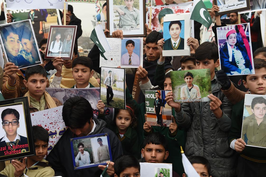 Pakistani relatives of schoolchildren killed in a Taliban attack on the Army Public School (APS) protest against delays in the investigation in Peshawar on February 7, 2015. Hundreds of parents, students and civil society members Saturday protested outside a Pakistani school over 